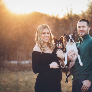 family holding two dogs at sunset Clifton Park Family photographer
