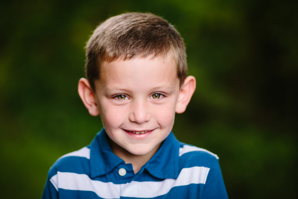 NY Capital Region family photographer young boy blue stripped shirt