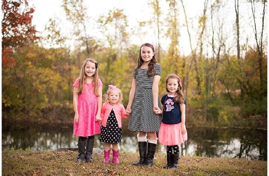 Four sisters holding hands