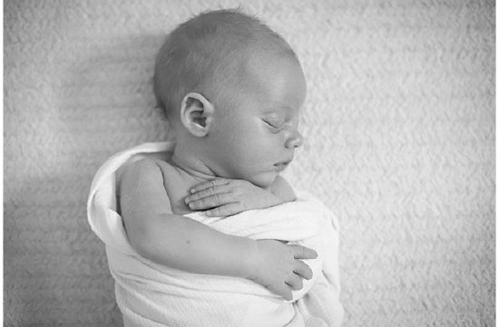 Sleeping peaceful newborn boy