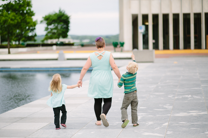 kids looking up at Empire State plaza
