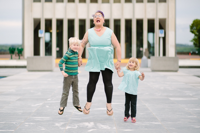 Mom and children jumping 