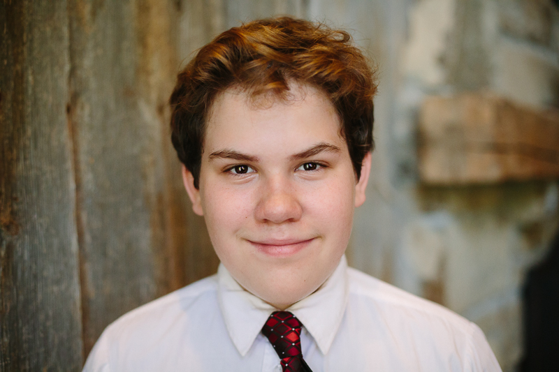 portrait of a young man in a white shirt and tie