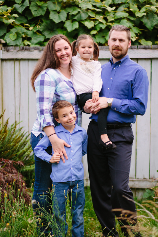 family wearing blue and white for family pictures