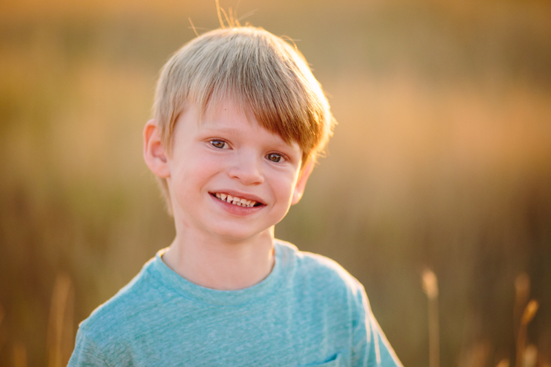 Little boy smiling in the sun