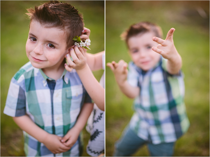 Boy getting flower in hair and spiderman fingers