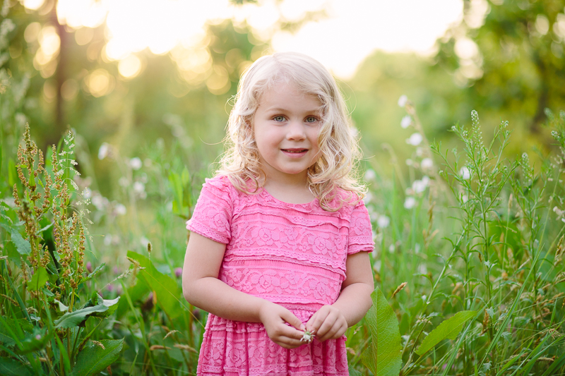 Portrait of a girl with golden light behind 