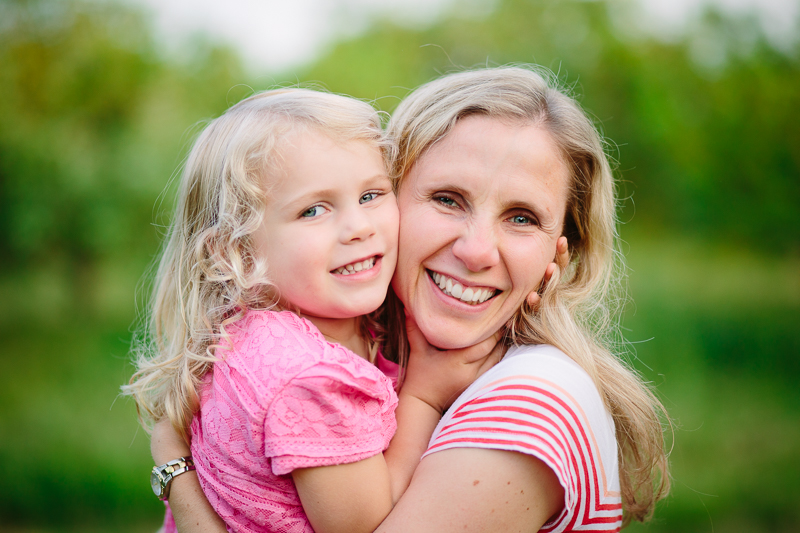 Little girl hugging her mom