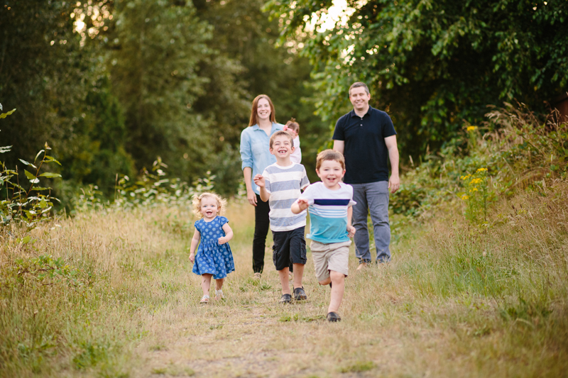 kids running away from parents smiling