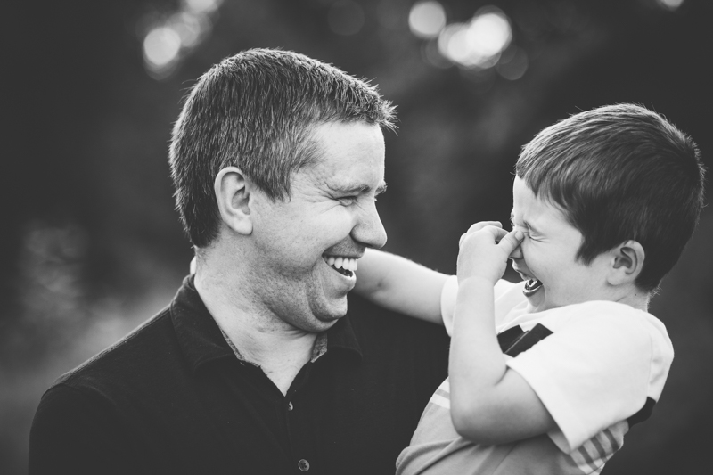 dad and son laughing