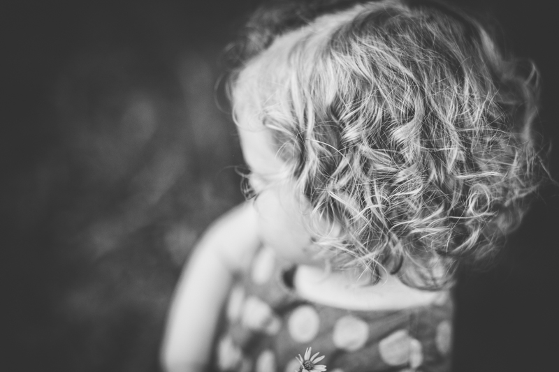 black and white picture of little girl curls