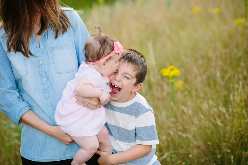 big brother making baby laugh