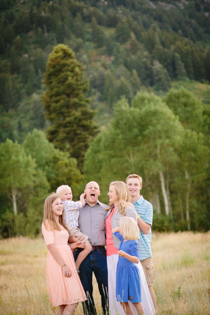 family of six laughing 
