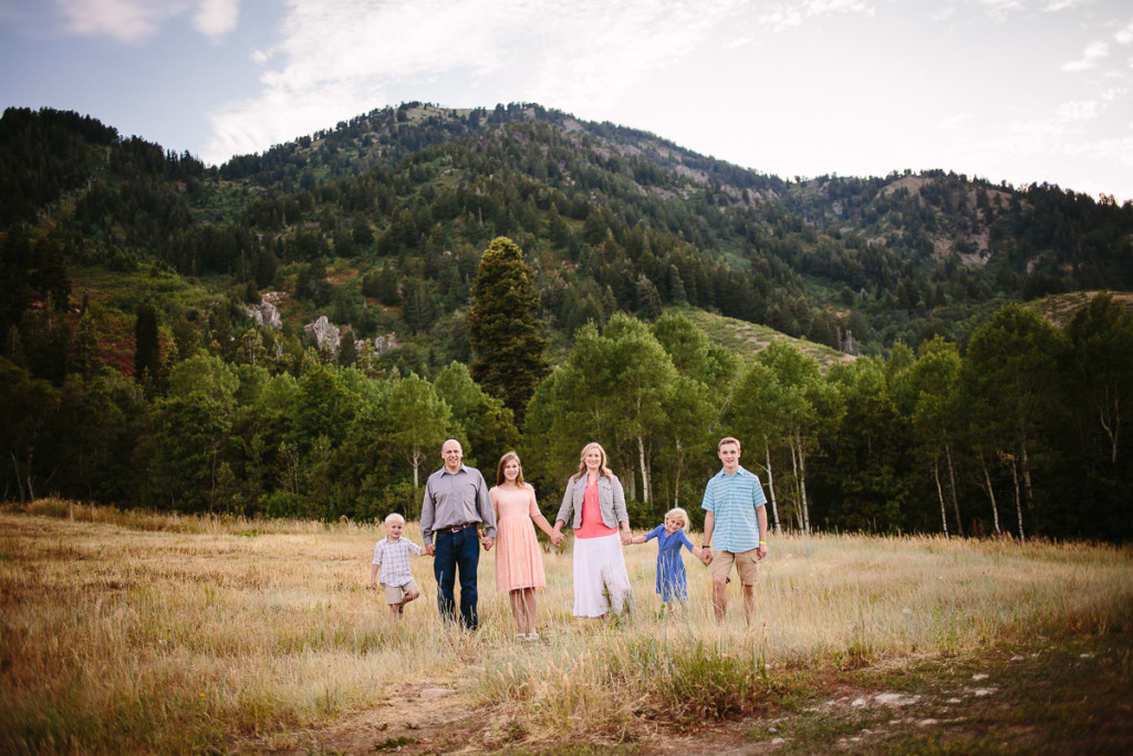 family walking and holding hands in utah