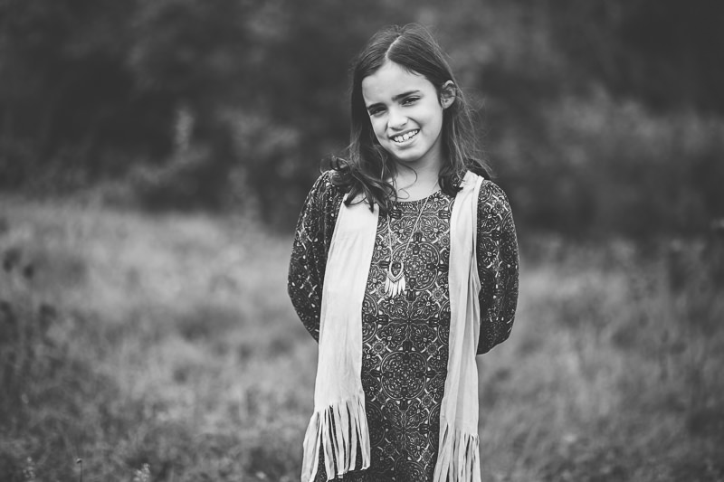 brown haired girl with white scarf and dress