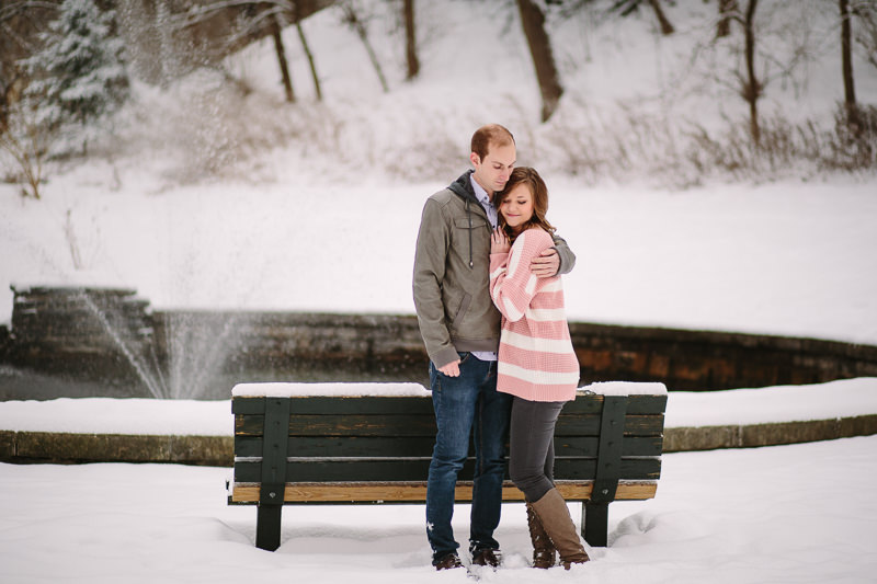 standing near a bench in the snow Congress Park