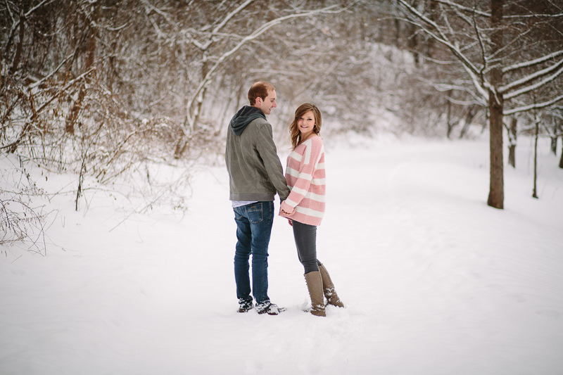 holding hands walking in the snow