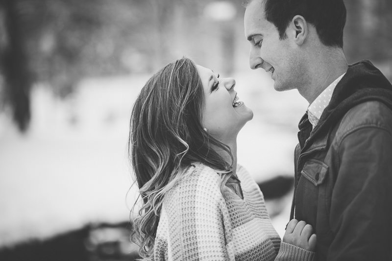 young man making girlfriend laugh