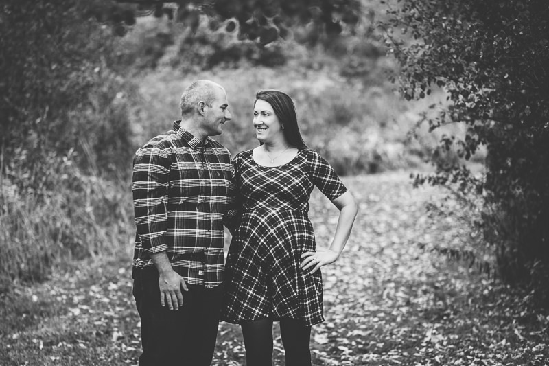 mom and dad looking at each other maternity