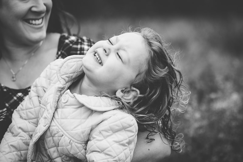 black and white picture of girl laughing