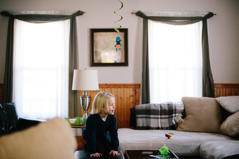 little boy with long blond hair waiting