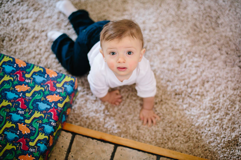 birthday boy crawling around on carpet