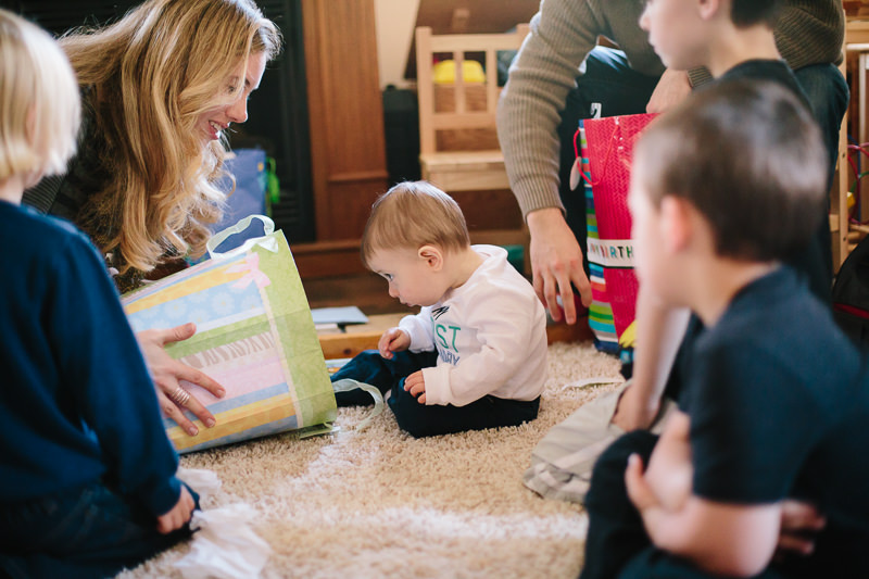 baby boy looking side of a gift bag