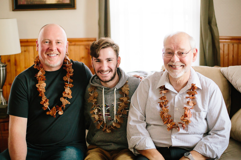 uncles grandpa and cousins wearing lei