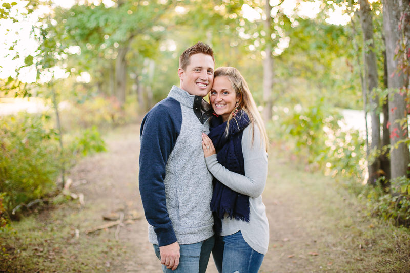 husband and wife standing close at vischer ferry preserve