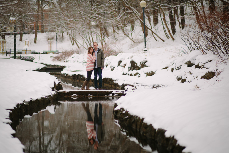 young couple dipping near Christmas tree