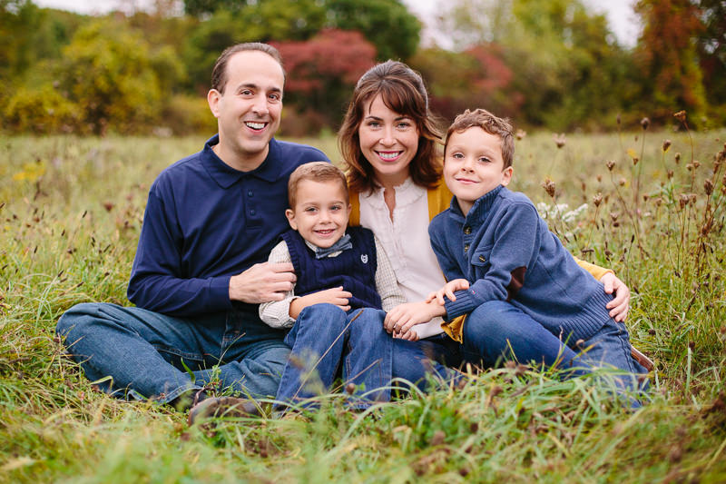 family with mom dad and two sons