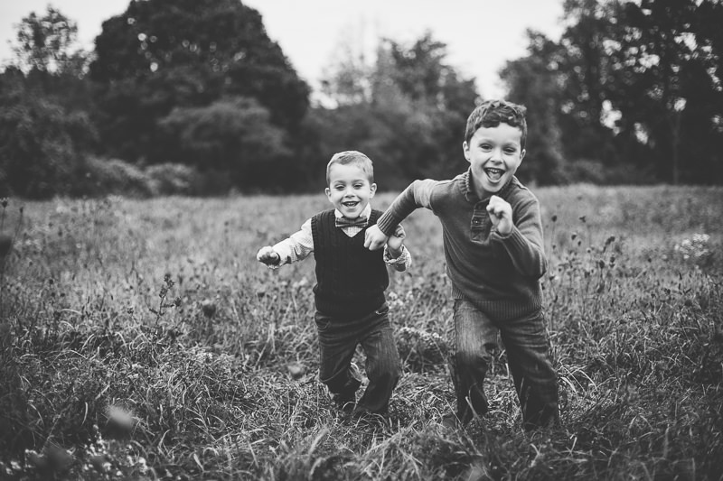 black and white picture of boys running