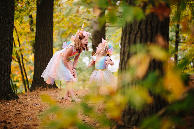 sisters talking wearing halloween costume