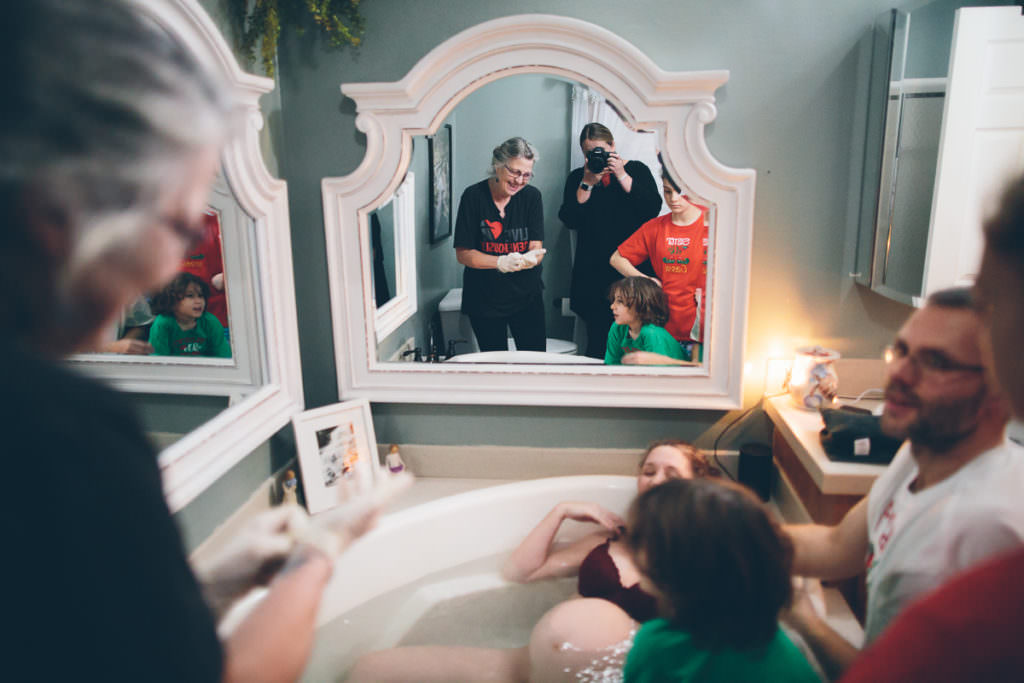 mirror reflection of midwife during labor