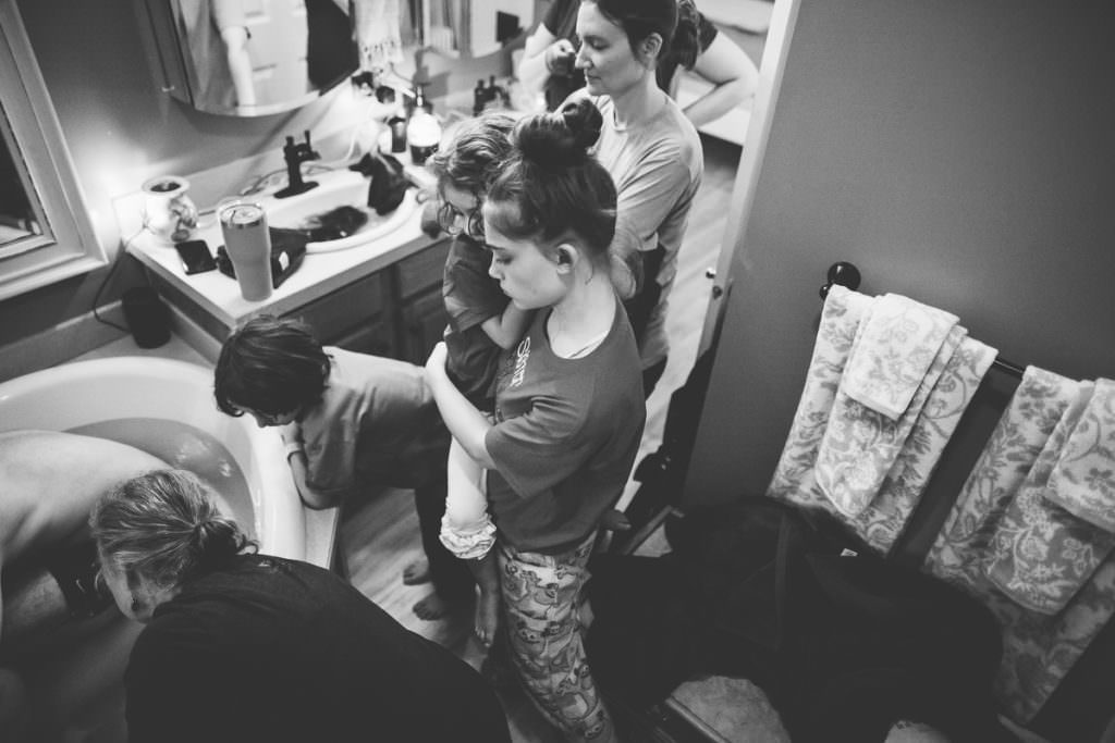 family waiting for baby birth