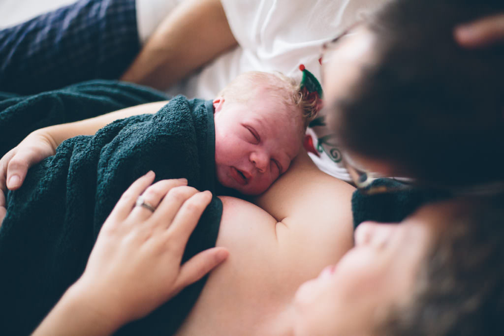 home birth newborn boy on mom chest