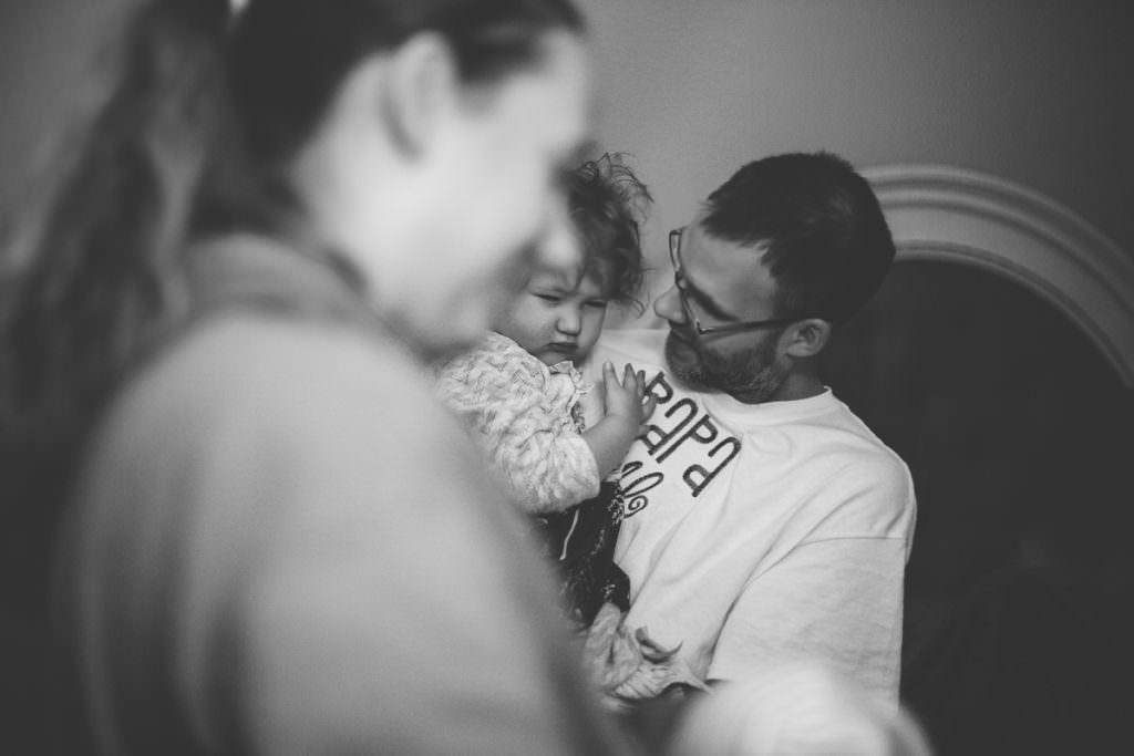 baby sister woken up to meet new baby