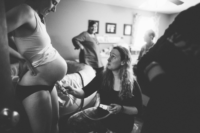 midwife checking heartbeat homebirth