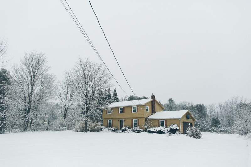 country home on snowy day