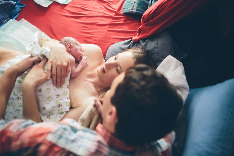 mom back in bed after home water birth