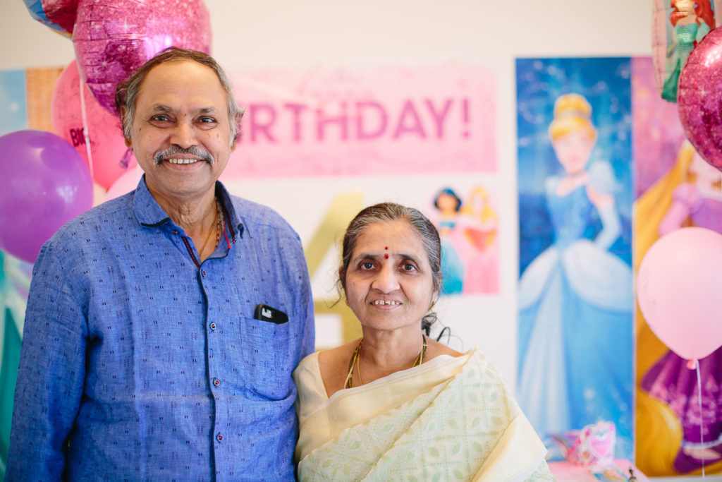 grandma and grandpa at granddaughter birthday party