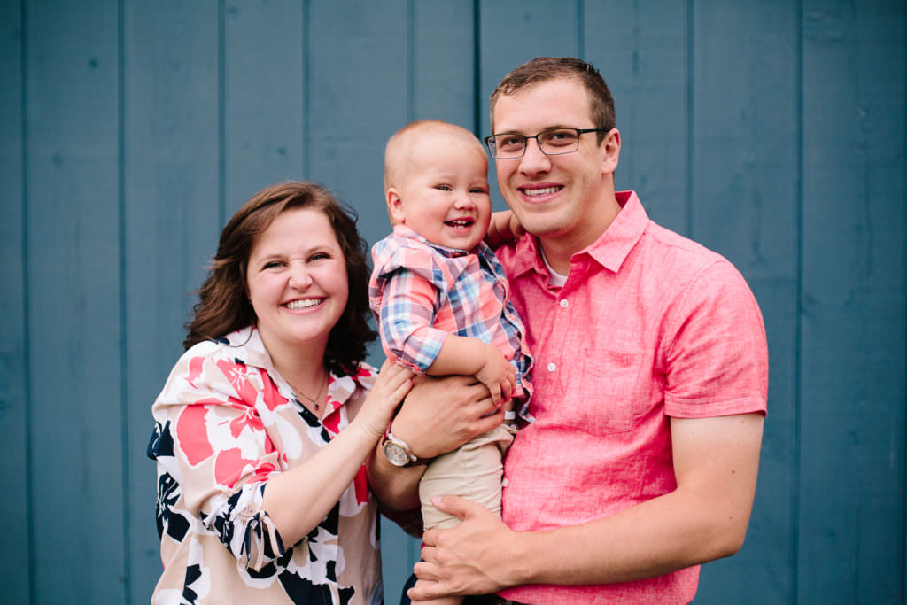 little family standing by barn fo'castle orchard