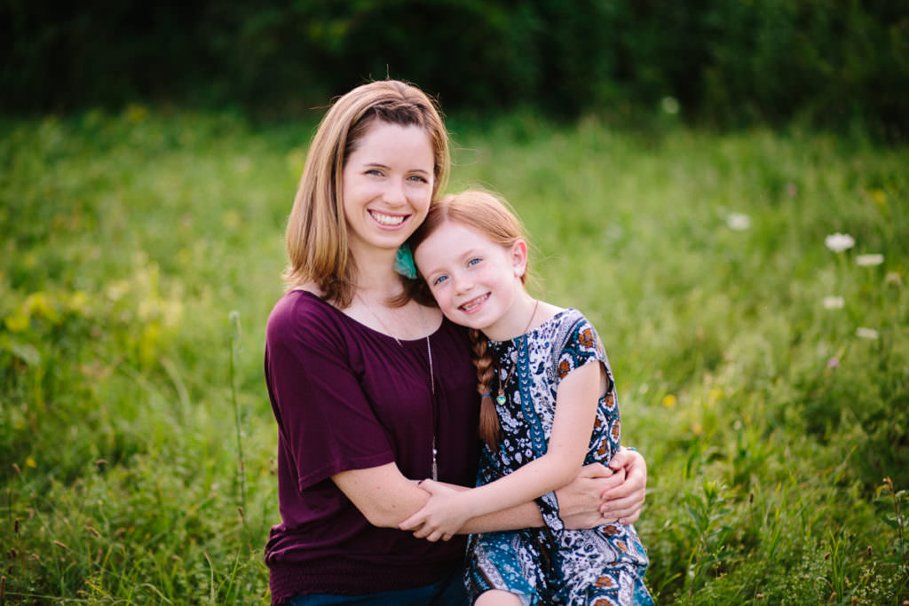 mom and daughter hugging