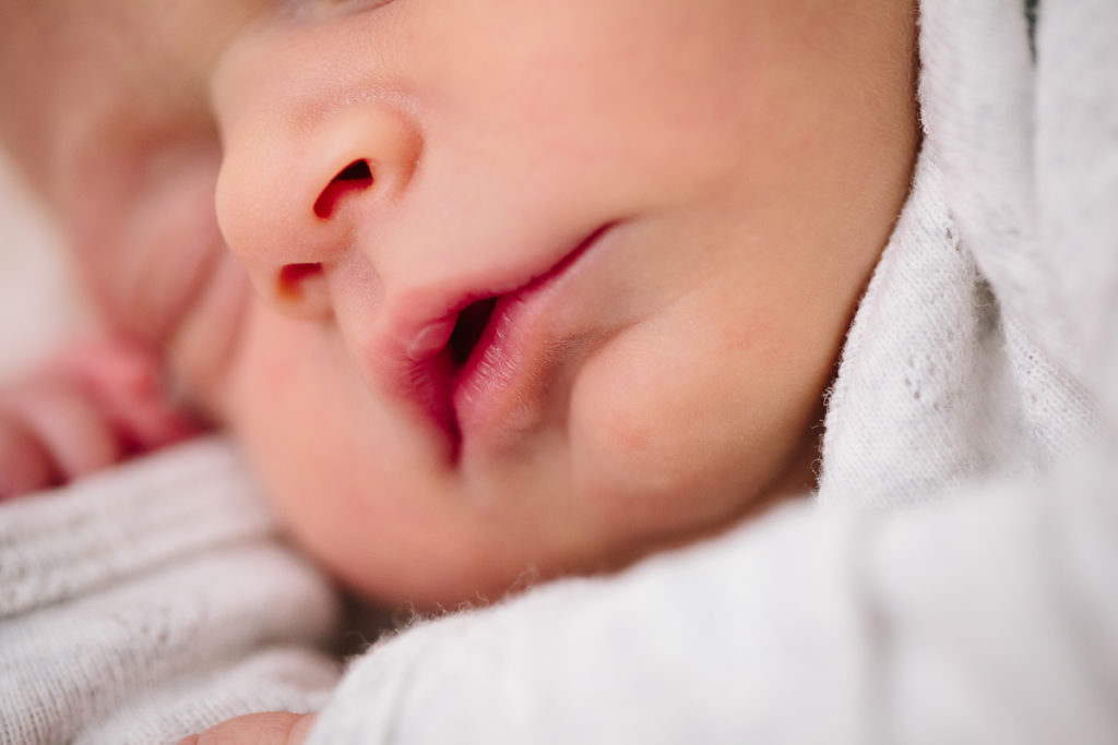 macro of newborn baby girl lips