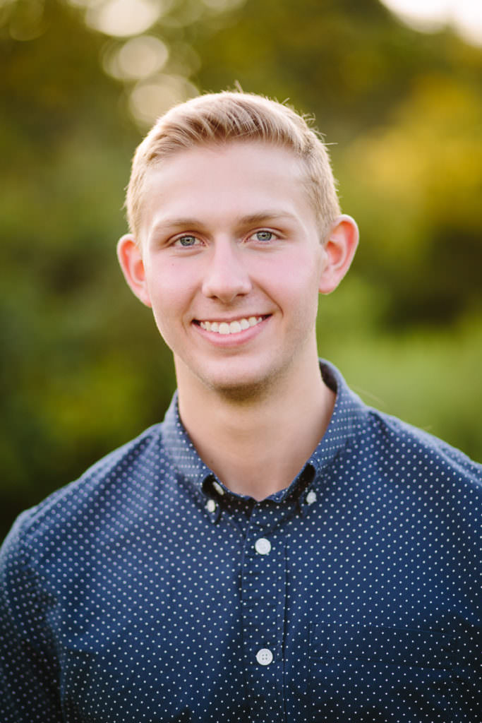 senior young man blonde hair and blue eyes