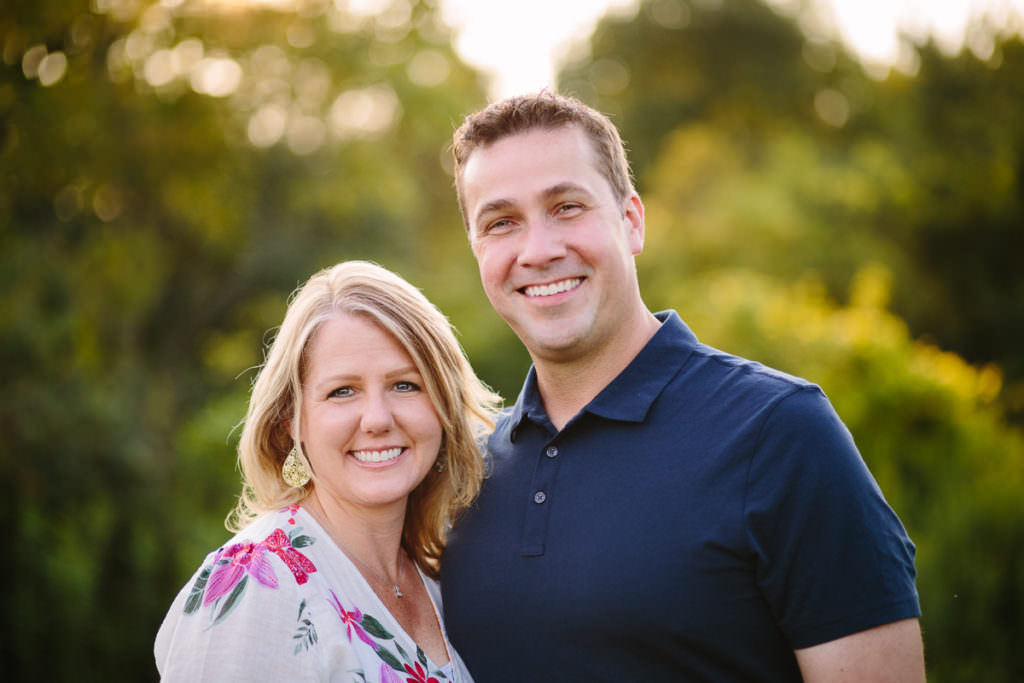 husband wife standing close