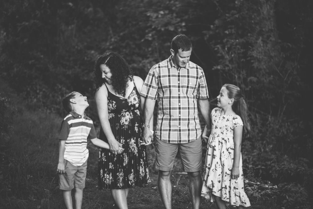 family of four talking to eachother