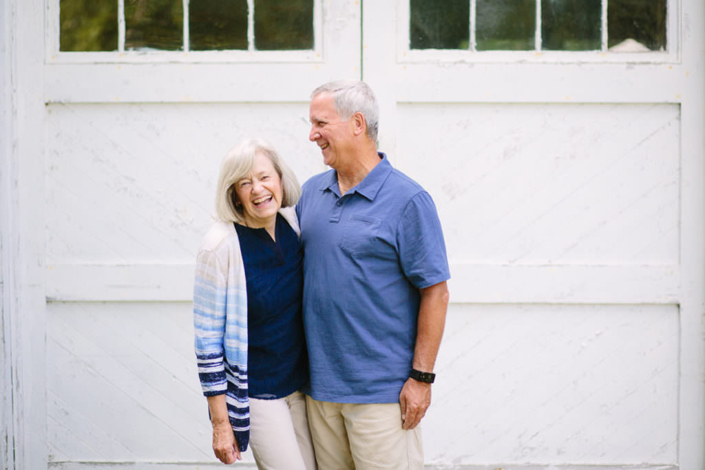 older woman and man laughing