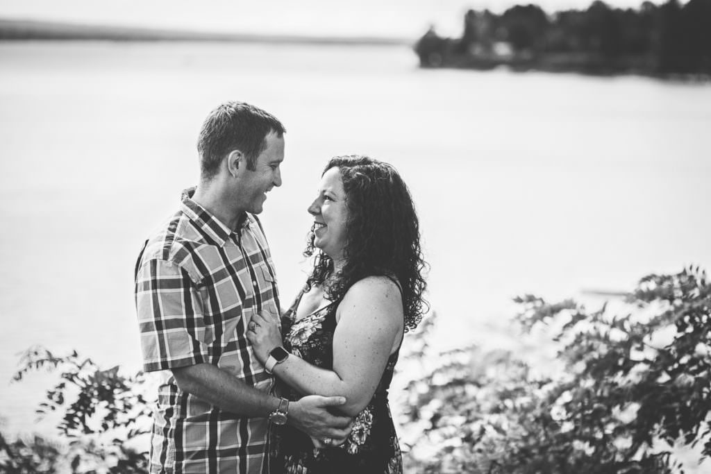 husband and wife smiling at each other