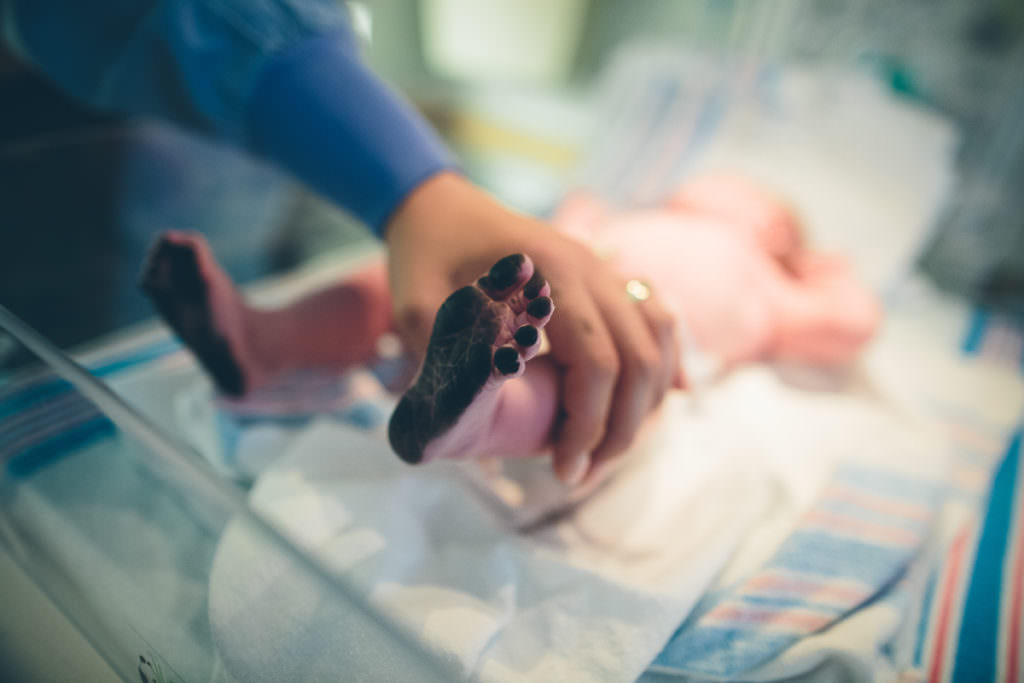 black ink on newborn baby feet